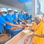 Food being  served to devotees as part of Reliance Foundation’s Anna Seva initiative in Puri